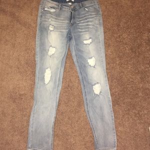 Light washed jeans with holes